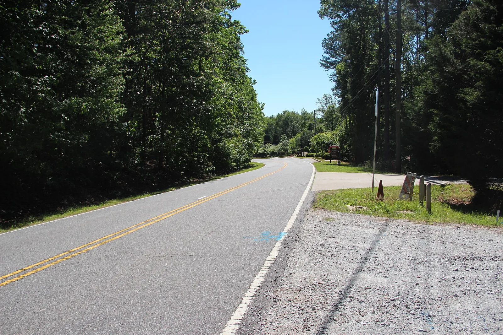 Freemanville Road, a wooded two-lane road in north Milton. The picture does not show Birmingham Park.