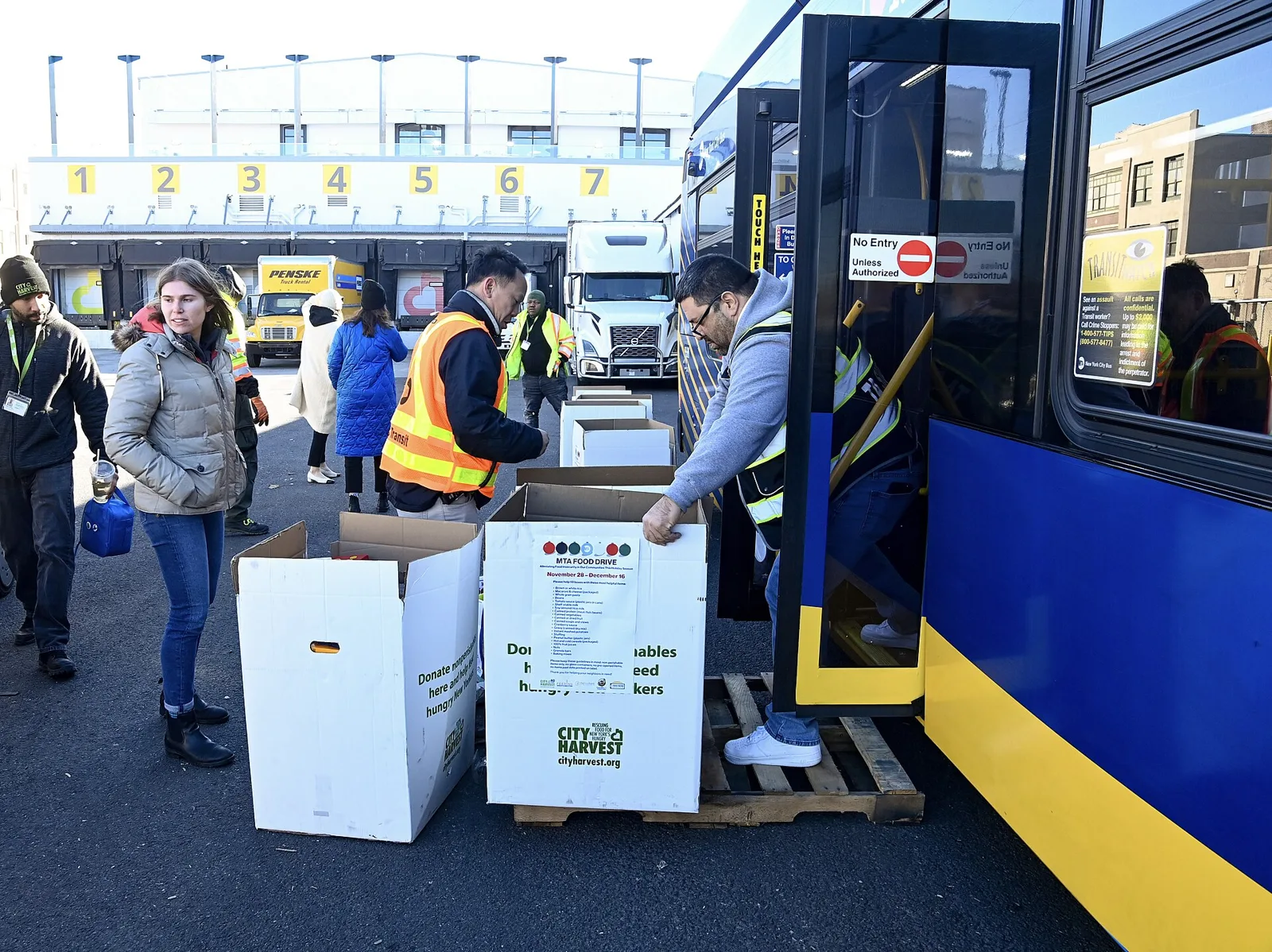 Boxes of donated food at a transit workers' holiday food drive in Brooklyn, New York.