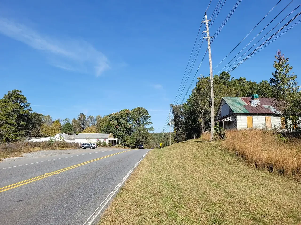 Arnold Mill Road (Georgia 140) through the Arnold Mill corridor in southwest Milton