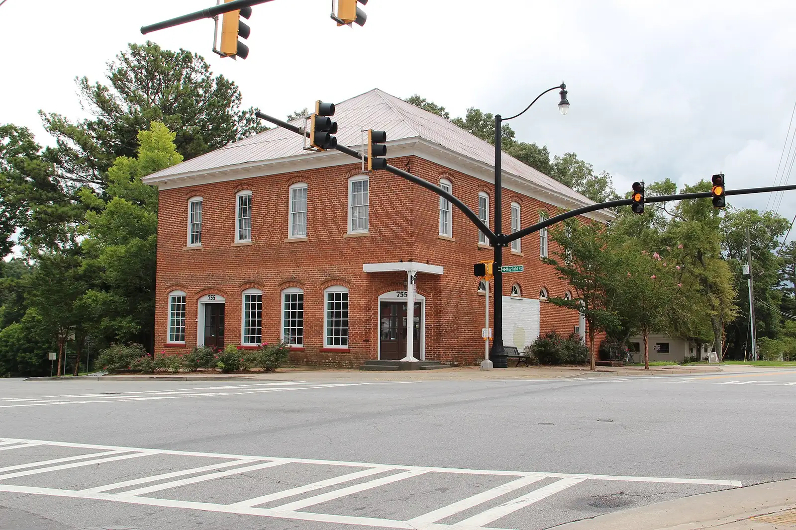 A historic brick building at the Crabapple crossroads in Milton