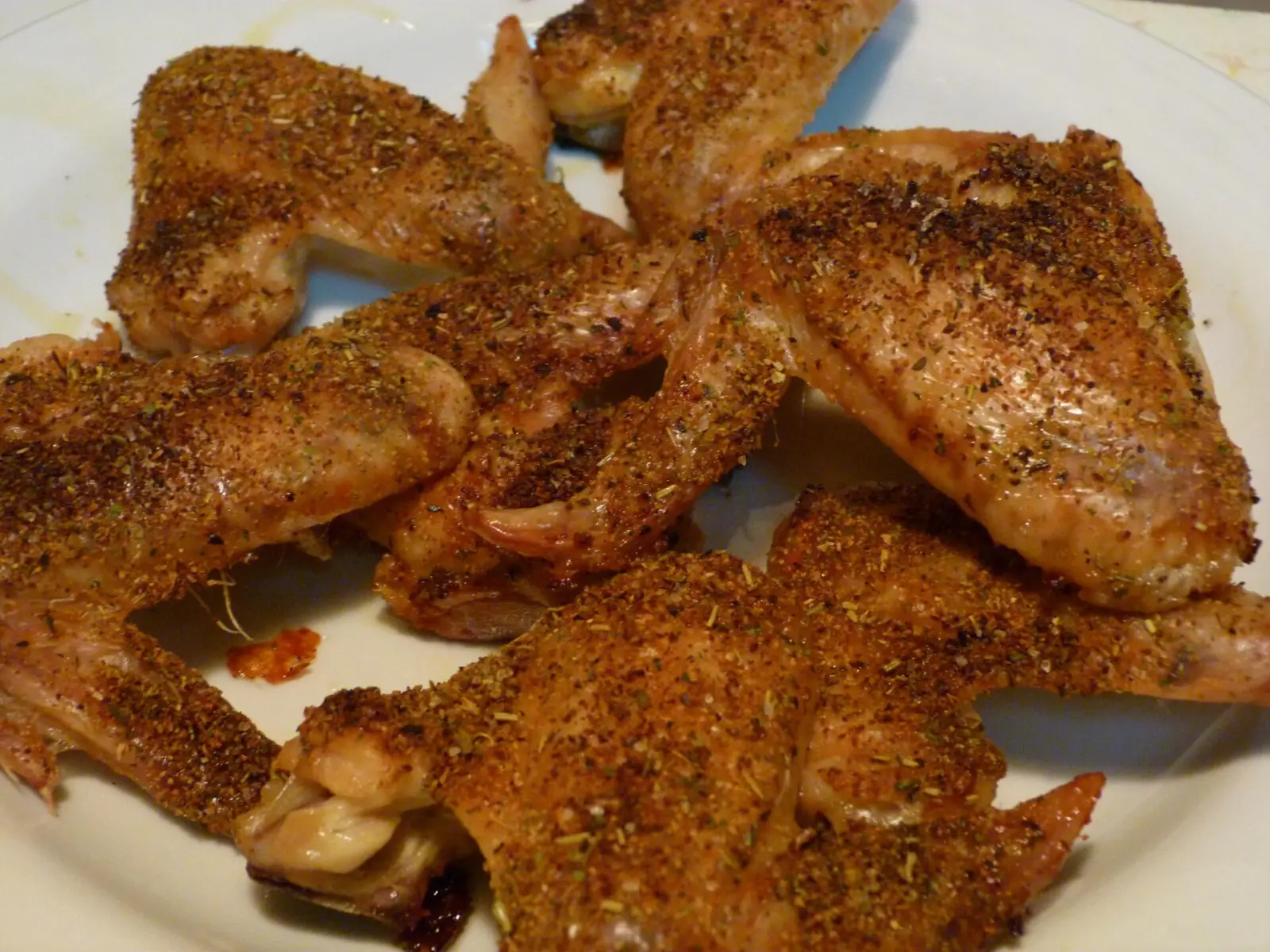 A plate of seasoned chicken wings. The photo was not taken at a Milton restaurant.